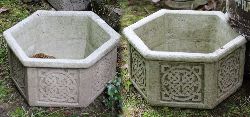 PAIR OF CELTIC MOULDED STONE GARDEN PLANTERS