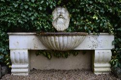 19TH-CENTURY MARBLE WALL FOUNTAIN WITH NEPTUNE MASK