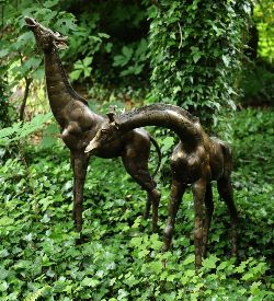 ENGAGING PAIR OF CONTEMPORARY BRONZE GARDEN SCULPTURES
