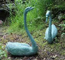 PAIR OF CAST BRONZE GARDEN SCULPTURES - SWANS