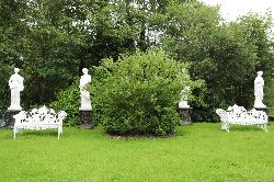 SET OF 4 CAST IRON GARDEN SCULPTURES