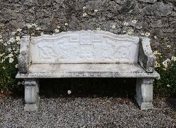 LARGE COMPOSITE STONE BENCH WITH MYTHICAL CREATURES