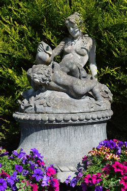 MOULDED STONE GARDEN WATER FEATURE WITH LADY AND CHILD ON CIRCULAR BASE