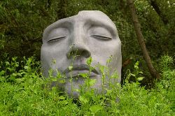 LARGE MOULDED STONE ART SCULPTURE OF A FACE