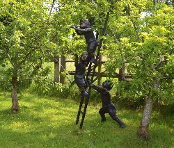 LIFESIZE BRONZE SCULPTURE OF CHILDREN ON LADDER