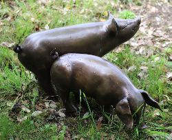 PAIR OF BRONZE PIG GARDEN SCULPTURES