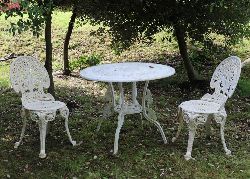 CAST IRON GARDEN TABLE AND TWO CHAIRS