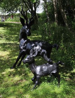 CAST IRON SCULPTURE OF A STAG AND A FAWN