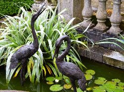PAIR OF LIFE-SIZE BRONZE MODELS OF CRANES WATER FOUNTAINS (BROWN)