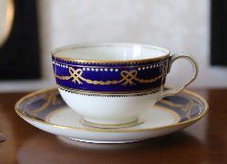 COALPORT & R. H. & CO. COBALT BLUE AND GILT COFFEE CUP AND SAUCER