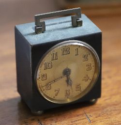 MID-CENTURY BRASS AND ENAMEL CUBIC DESK CLOCK