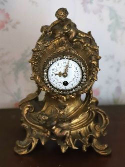FRENCH GILT METAL MANTEL CLOCK