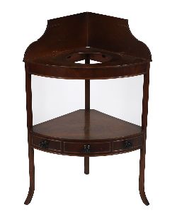 REFINED GEORGE III PERIOD MAHOGANY BOWFRONT CORNER WASHSTAND
