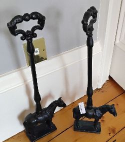 PAIR OF CAST IRON HORSE-FORM DOORSTOPS