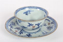 CHINESE DYNASTY BLUE AND WHITE CUP AND SAUCER