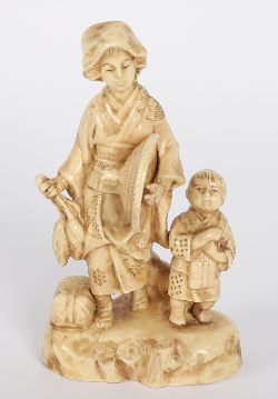 JAPANESE CERAMIC GROUP OF WOMAN AND CHILD