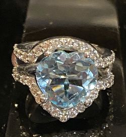 18 CT. WHITE GOLD BLUE TOPAZ AND DIAMOND HAND MADE RING