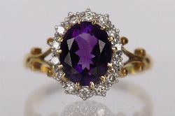 18 CARAT GOLD AMETHYST AND DIAMOND CLUSTER RING