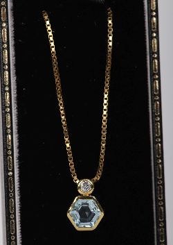 14 CARAT GOLD AQUAMARINE AND DIAMOND PENDANT