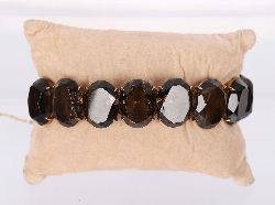 14 CARAT GOLD 50 CARAT SMOKEY QUARTZ BRACELET
