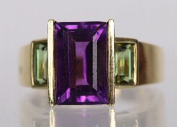 18 CARAT GOLD, AMETHYST, AND TOURMALINE RING