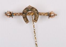 9CT. GOLD HORSESHOE BROOCH