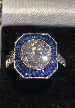 18 CT. WHITE GOLD DIAMOND AND SAPPHIRE RING