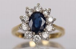 18 CARAT GOLD, SAPPHIRE AND DIAMOND CLUSTER RING