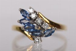 18 CARAT GOLD SAPPHIRE AND DIAMOND CLUSTER RING
