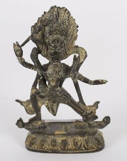 SOUTH INDIAN BRONZE FIGURE OF NARASHIMHA SLAYING HIRANYAKASHIPU