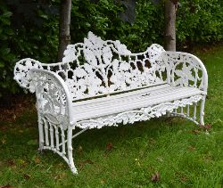 HEAVY CAST IRON COALBROOKDALE DESIGN GARDEN SEAT WITH OAK LEAF BACK AND SCROLL ARMS