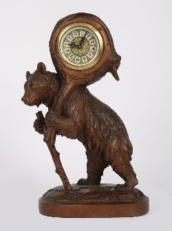 19TH-CENTURY BLACK FOREST CARVED BEAR CLOCK