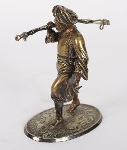 ANGLO-INDIAN SILVER-PLATED FIGURE OF A WATER CARRIER