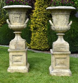 PAIR OF MOULDED SANDSTONE THOMAS HOPE DESIGN GARDEN URNS ON MATCHING PEDESTALS