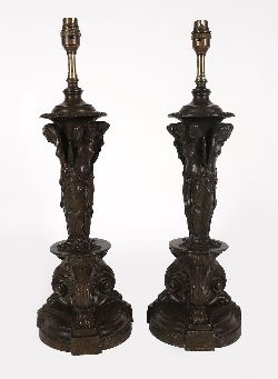 PAIR OF PATINATED BRONZE FIGURAL LAMPS