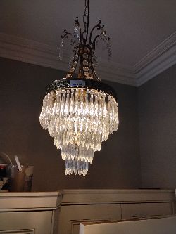 LARGE EDWARDIAN TIERED CRYSTAL CHANDELIER
