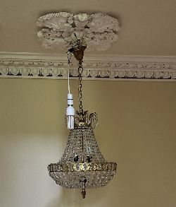 BASKET FORM CHANDELIER IN CRYSTAL AND BRASS