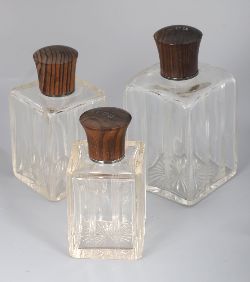 SET OF THREE 19TH-CENTURY CUT GLASS DECANTERS