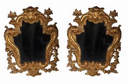 PAIR OF 19TH-CENTURY DECORATIVE GILTWOOD ARMORIAL-STYLE MIRRORS