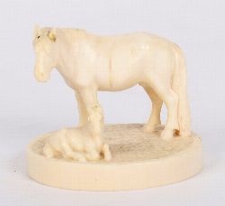 19TH-CENTURY IVORY CARVING OF HORSE AND DOG