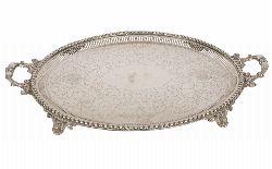 A STRIKING 19TH-CENTURY SILVER-PLATED TWO-HANDLED TRAY